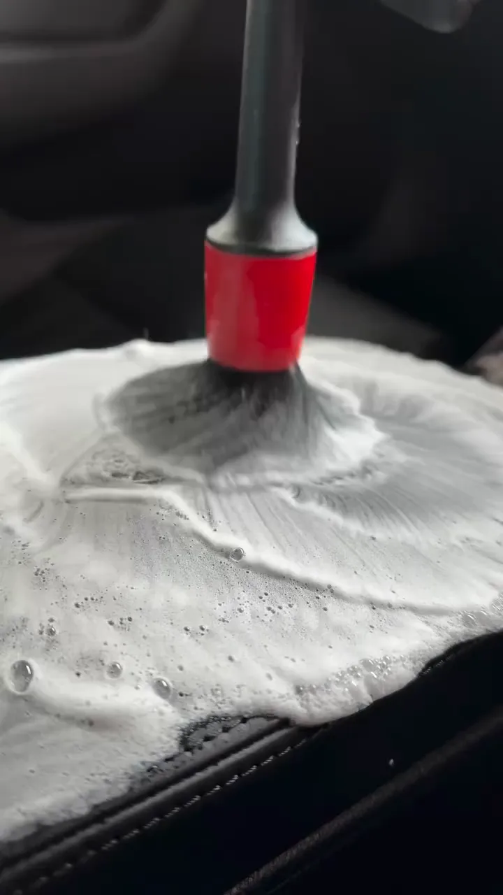 Soft brush cleaning a centre console